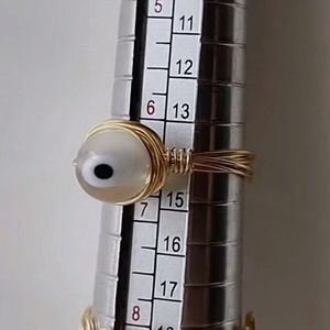 White evil eye ring